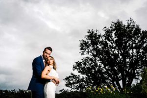 Bride and Groom Take Photographs in the Grounds of Rowton Castle
