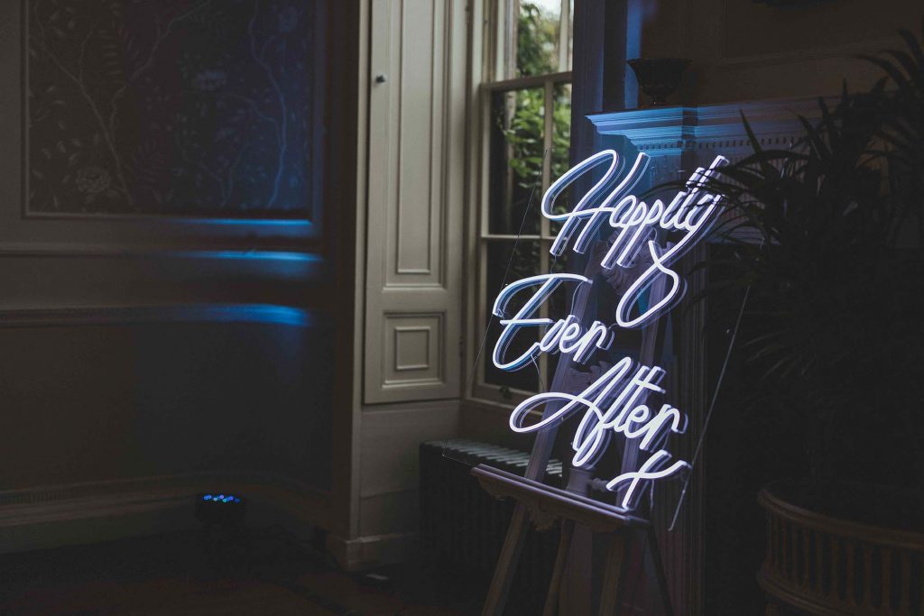 "Happily Ever After" Neon sign photographed in the Cardeston Suite during the Evening Party