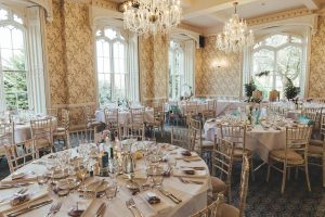 Rowton Castle&#039;s Cardeston Suite is photographed set with tables and chairs ready for the Wedding Breakfast to begin