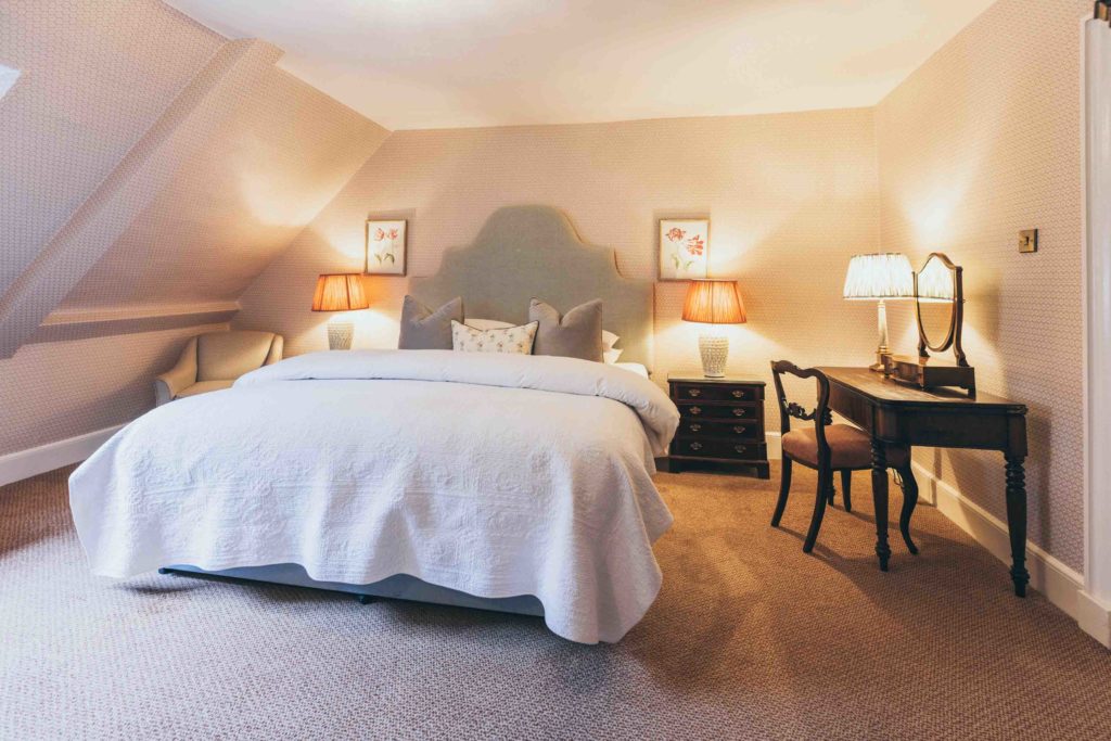 One of Rowton Castle's Family Rooms. A Soft Scheme that Incorporates a Double Bed and Sofa Bed