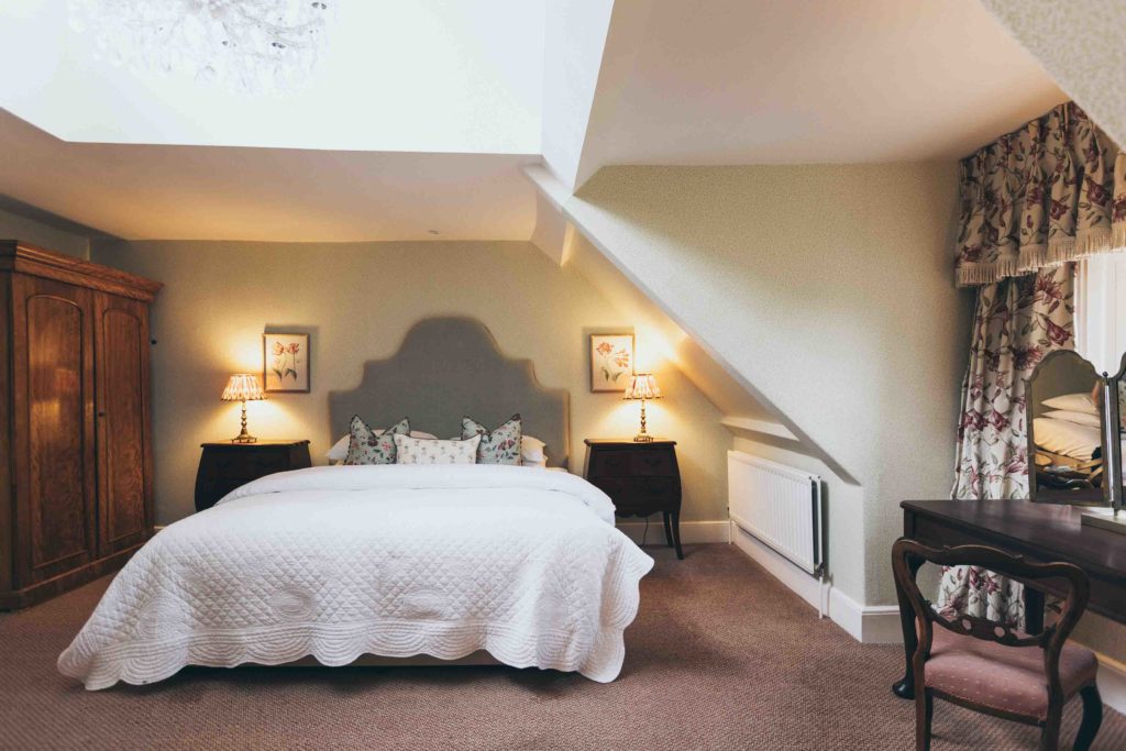 One of Rowton Castle's Family Rooms. A Soft Scheme that Incorporates a Double Bed and Sofa Bed