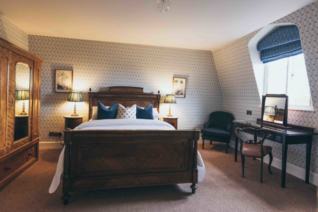 One of Rowton Castle's Family Rooms. An Interesting Blue Scheme that Incorporates a Double Bed and Single Bed