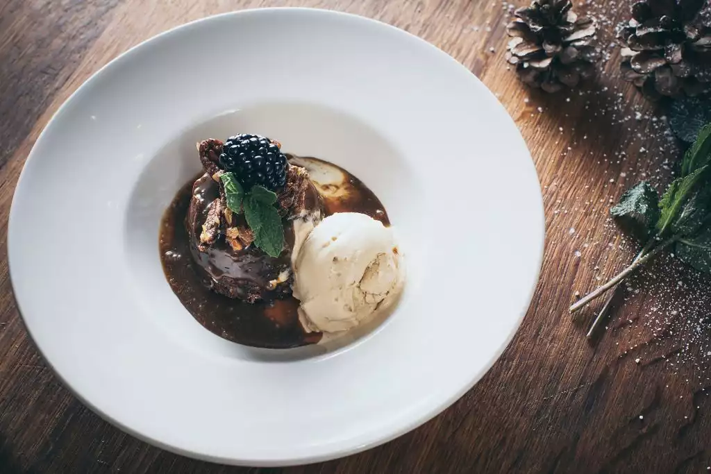 Chocolate dessert with ice cream and berries served at a Rowton Castle wedding breakfast